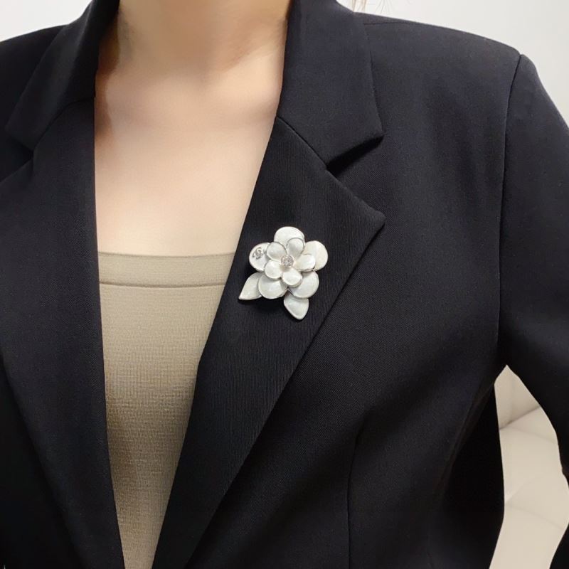 Ch*el brooches